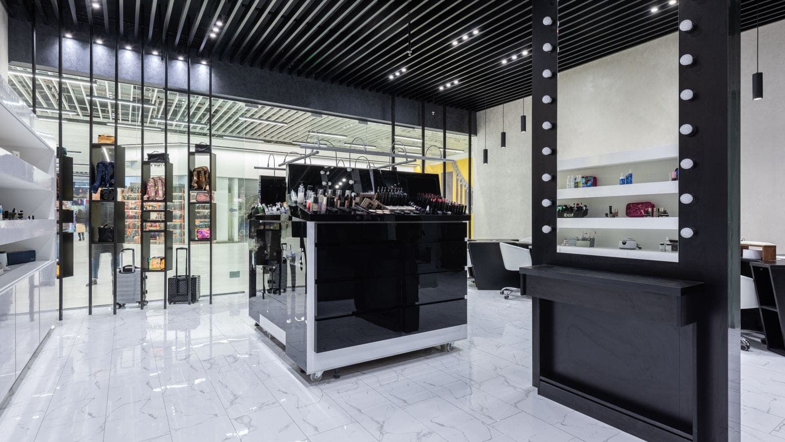 Sleek modern cosmetics store interior with a central makeup display and polished marble floor